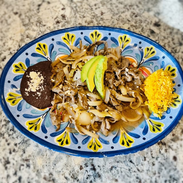 Bistek Encebollado.